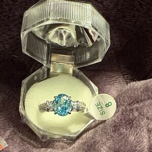 Bomb Party Aquamarine Gemstone Cubic Zircona Plated in Rhodium Plating Size 8